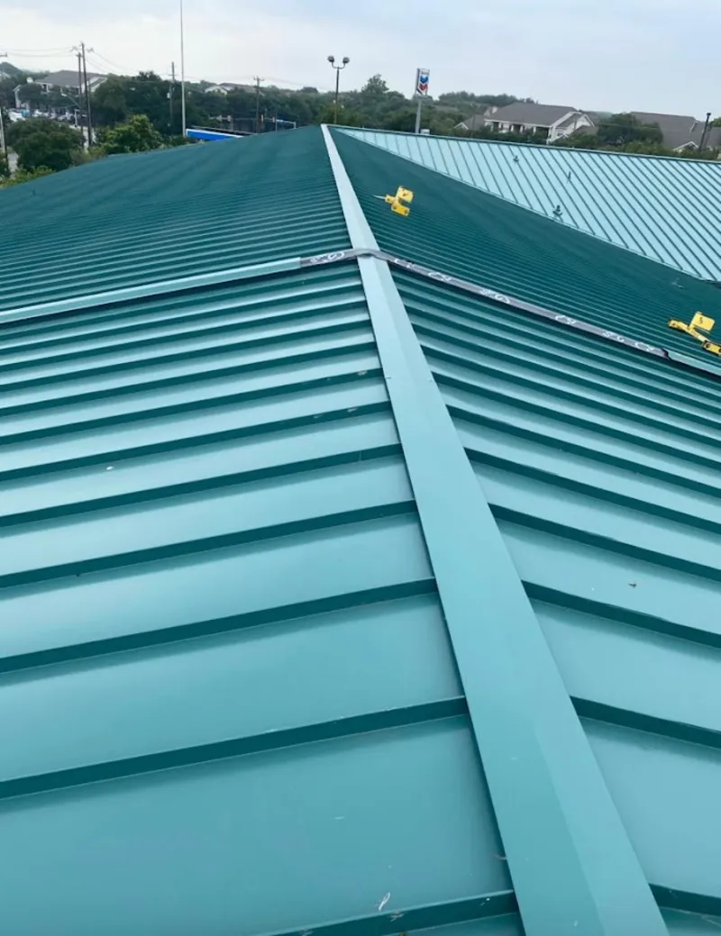 Green commercial metal roof ridge and valley for Metal Roof Repair in North Plainfield