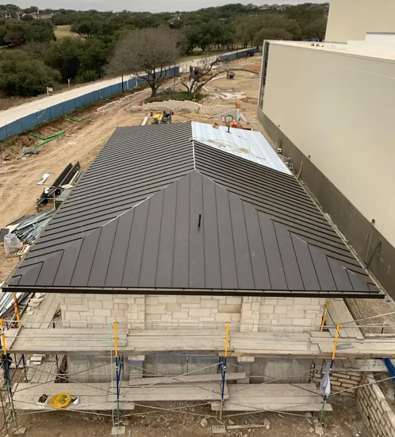 Metal roof new construction with scaffolding in North Plainfield