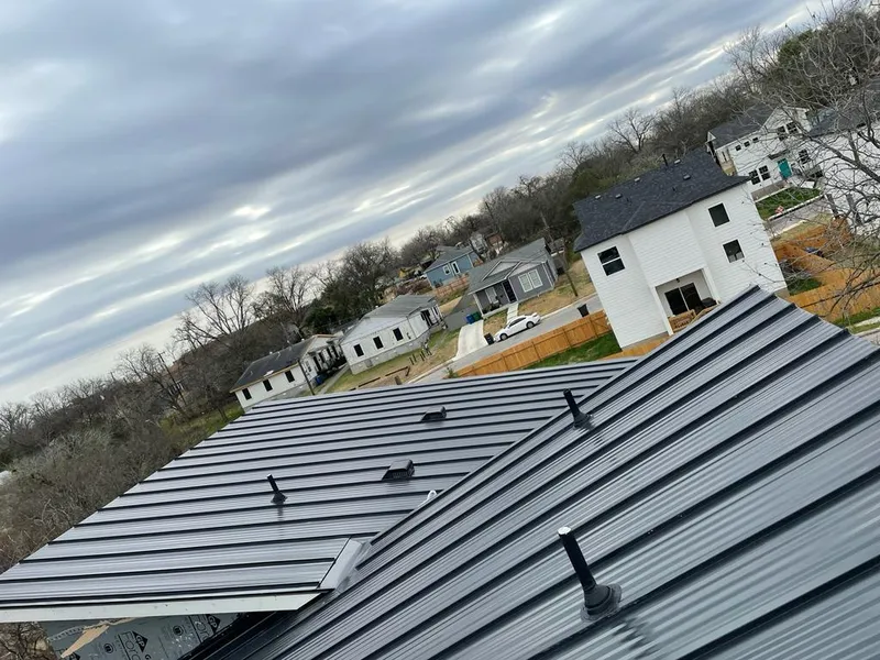 Standing seam metal roof panels with vents for Skylight Repair in North Plainfield